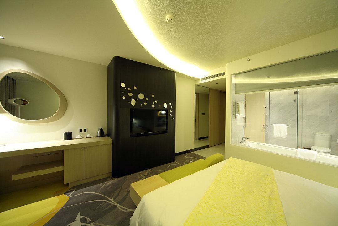 cosmic deluxe room  | minibar, in-room safe, desk, blackout curtains