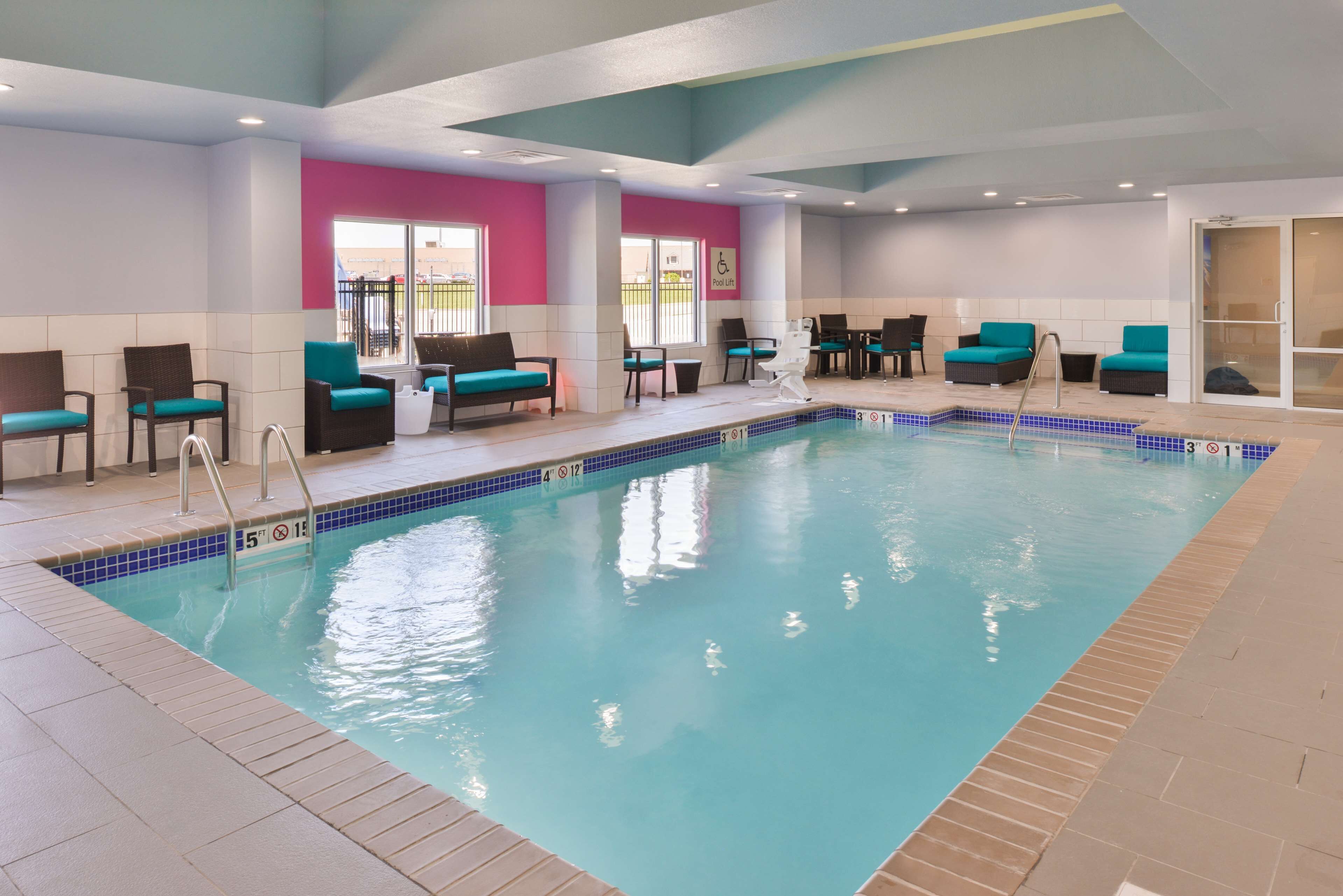 indoor pool, open 8:00 am to 10:00 pm, pool umbrellas