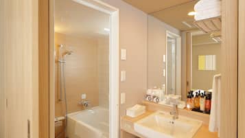 Combined shower/tub, deep soaking tub, free toiletries, hair dryer