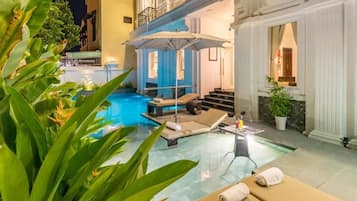 Outdoor pool, pool umbrellas, pool loungers