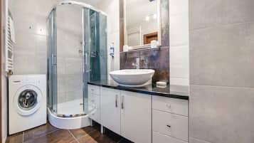 Apartment, 1 Bedroom, Balcony | Bathroom | Shower, hair dryer, towels