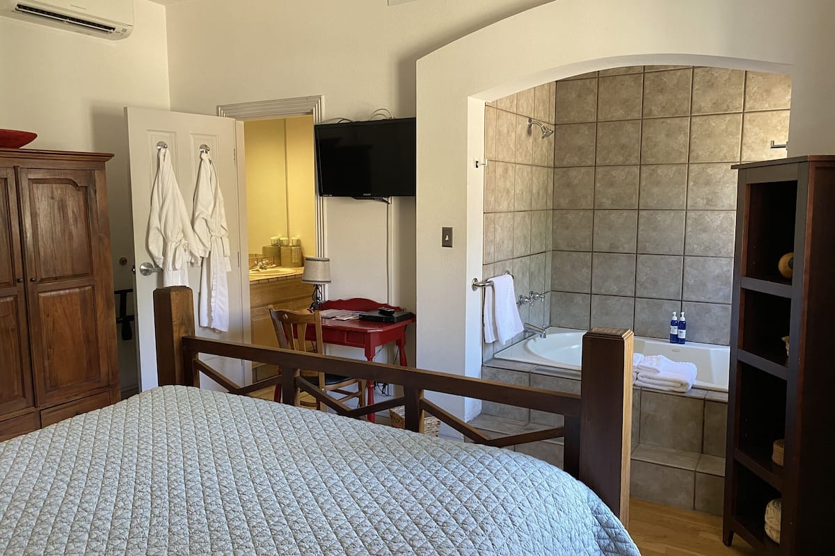 combined shower/bathtub, eco-friendly toiletries, hair dryer, bathrobes