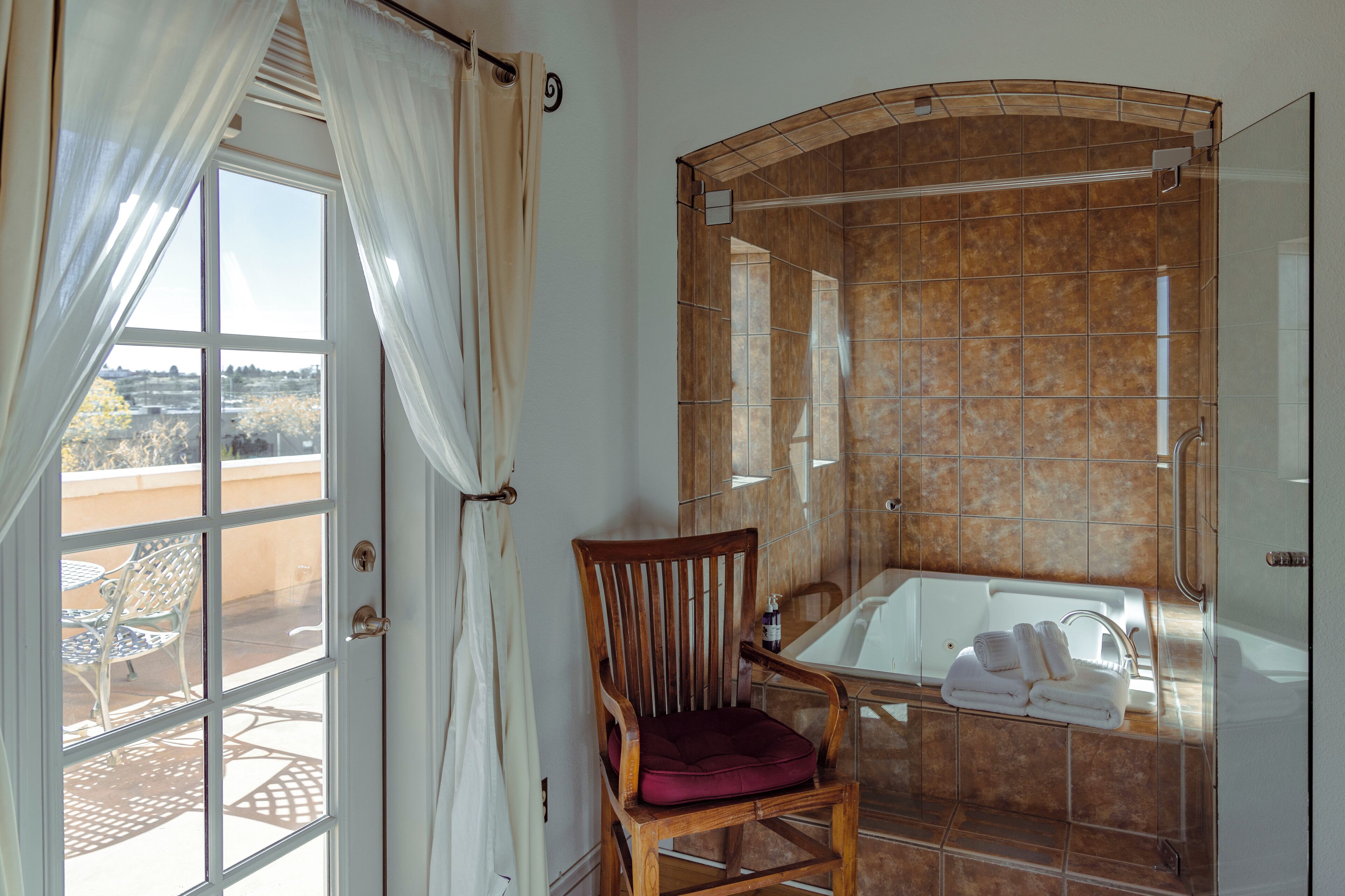 Deluxe Suite, 1 King Bed with Sofa bed, Balcony (Ted Turner Suite) | Desk, WiFi (free), individually decorated, bed sheets