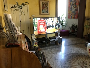 85-inch flat-screen TV with digital channels, TV, Netflix