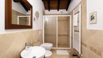 Ein Badezimmer mit Waschbecken, Toilette und Dusche.