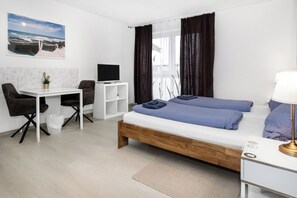 Apartament, 2 dormitoris, cuina | 1 dormitori, escriptori, planxa i posts de planxar i wifi gratuïta 