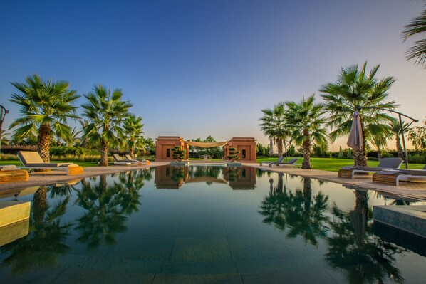 Outdoor pool, pool umbrellas, pool loungers
