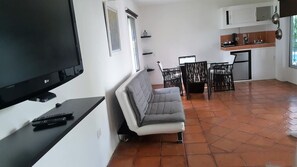 Apartment, 1 Bedroom, Pool View | Room amenity