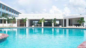 Outdoor pool, pool umbrellas, sun loungers
