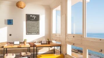 Breakfast, lunch served; local and international cuisine, ocean views