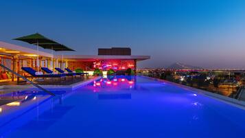 Outdoor pool, open 7:00 AM to 11:00 PM, pool cabanas (surcharge)