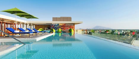 Outdoor pool, open 7:00 AM to 11:00 PM, pool cabanas (surcharge)