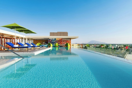 Outdoor pool, open 7:00 AM to 11:00 PM, cabanas (surcharge)