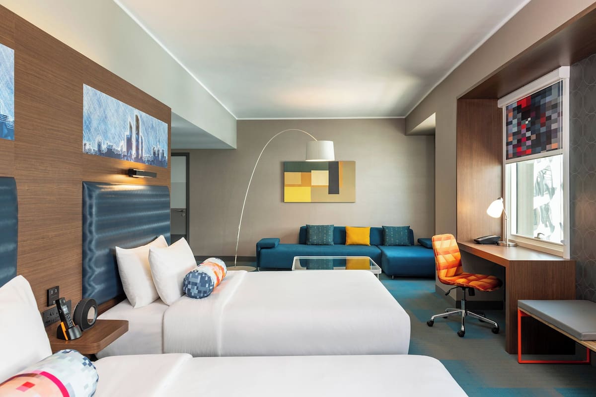 aloft, junior suite, 2 queen beds | 1 bedroom, minibar, in-room safe, desk