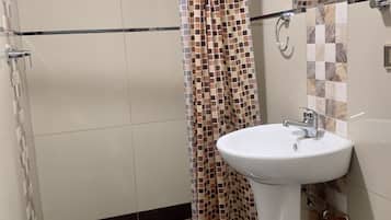 Twin Room, Mountain View | Bathroom | Shower, free toiletries, towels