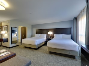Premium bedding, pillow-top beds, desk, blackout curtains