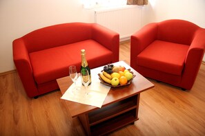 Comfort Suite, 1 Bedroom | In-room safe, desk, blackout drapes, iron/ironing board