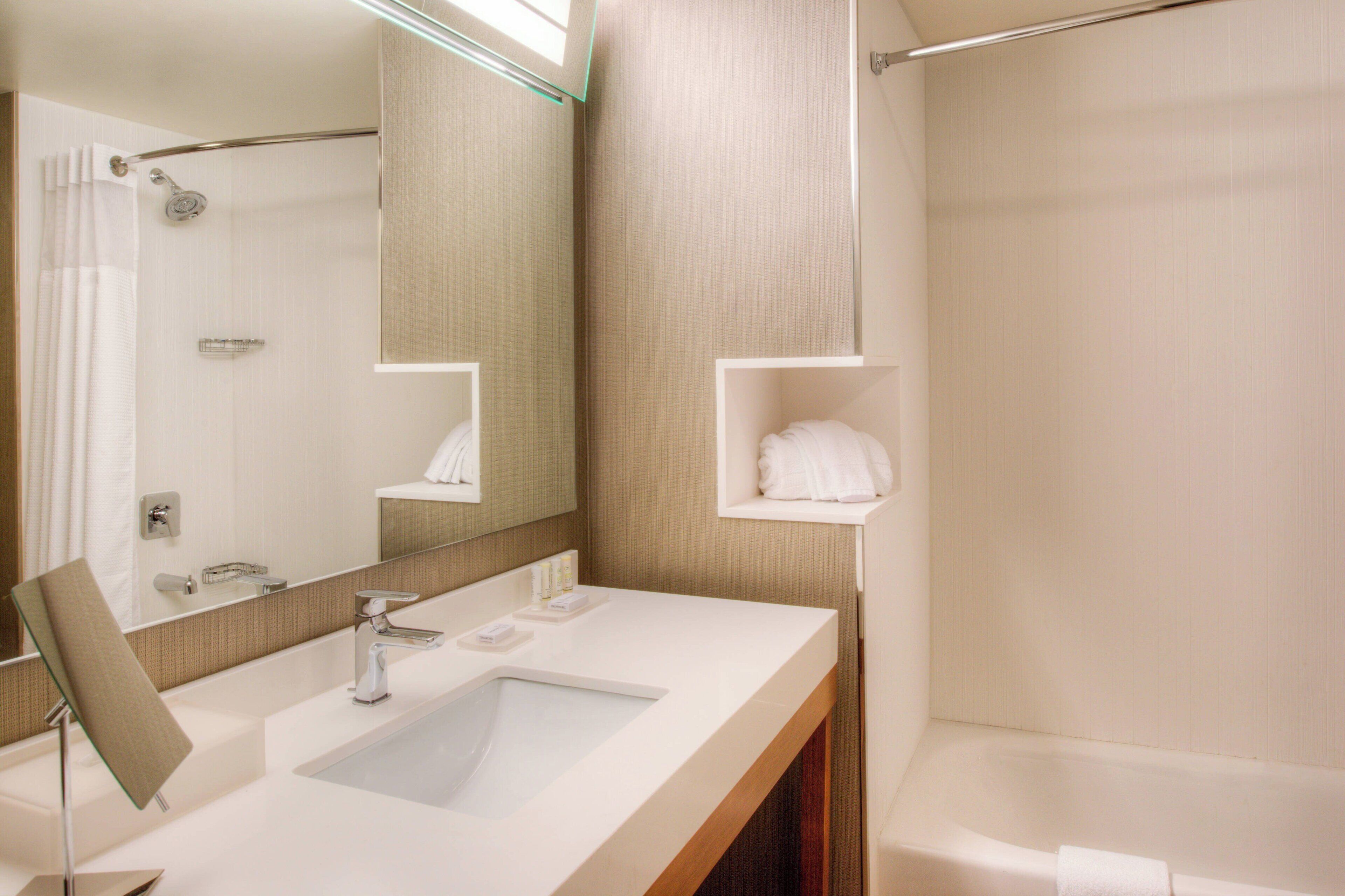 hair dryer, towels, soap, shampoo