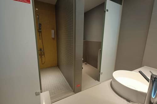 Superior Double Room, City View | Bathroom | Shower, hair dryer, slippers, towels