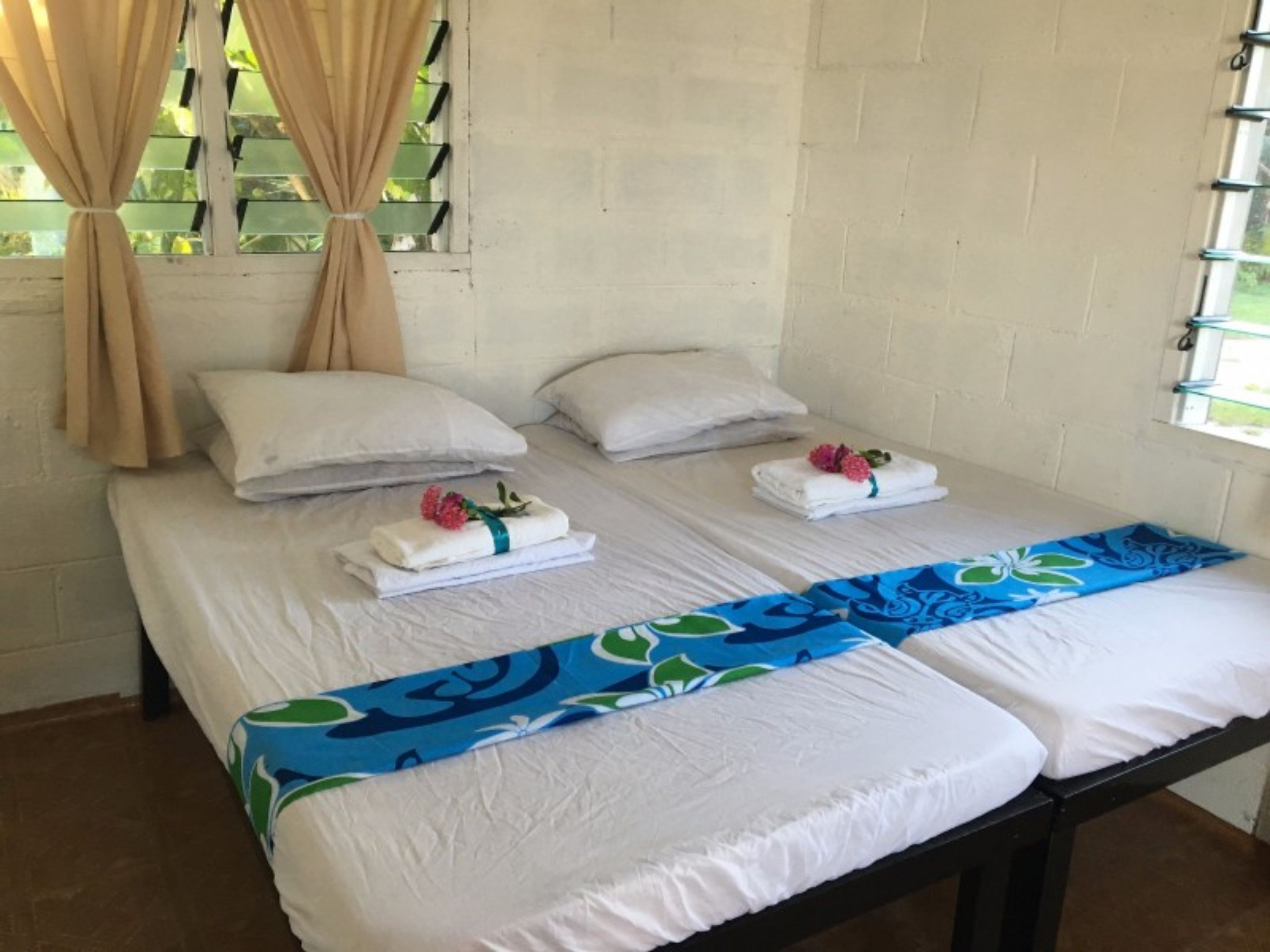 basic bungalow, 1 bedroom, shared bathroom, oceanfront | 1 bedroom, iron/ironing board, bed sheets