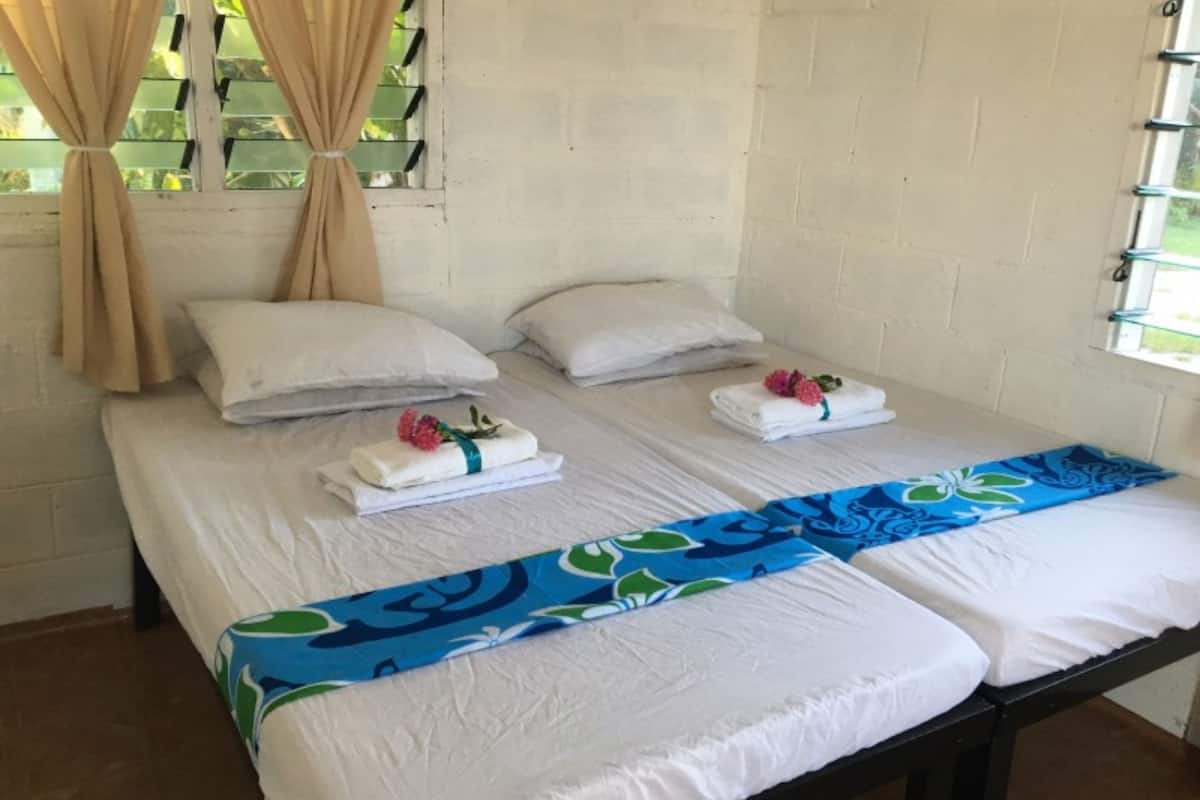 basic bungalow, 1 bedroom, shared bathroom, oceanfront | 1 bedroom, iron/ironing board, bed sheets