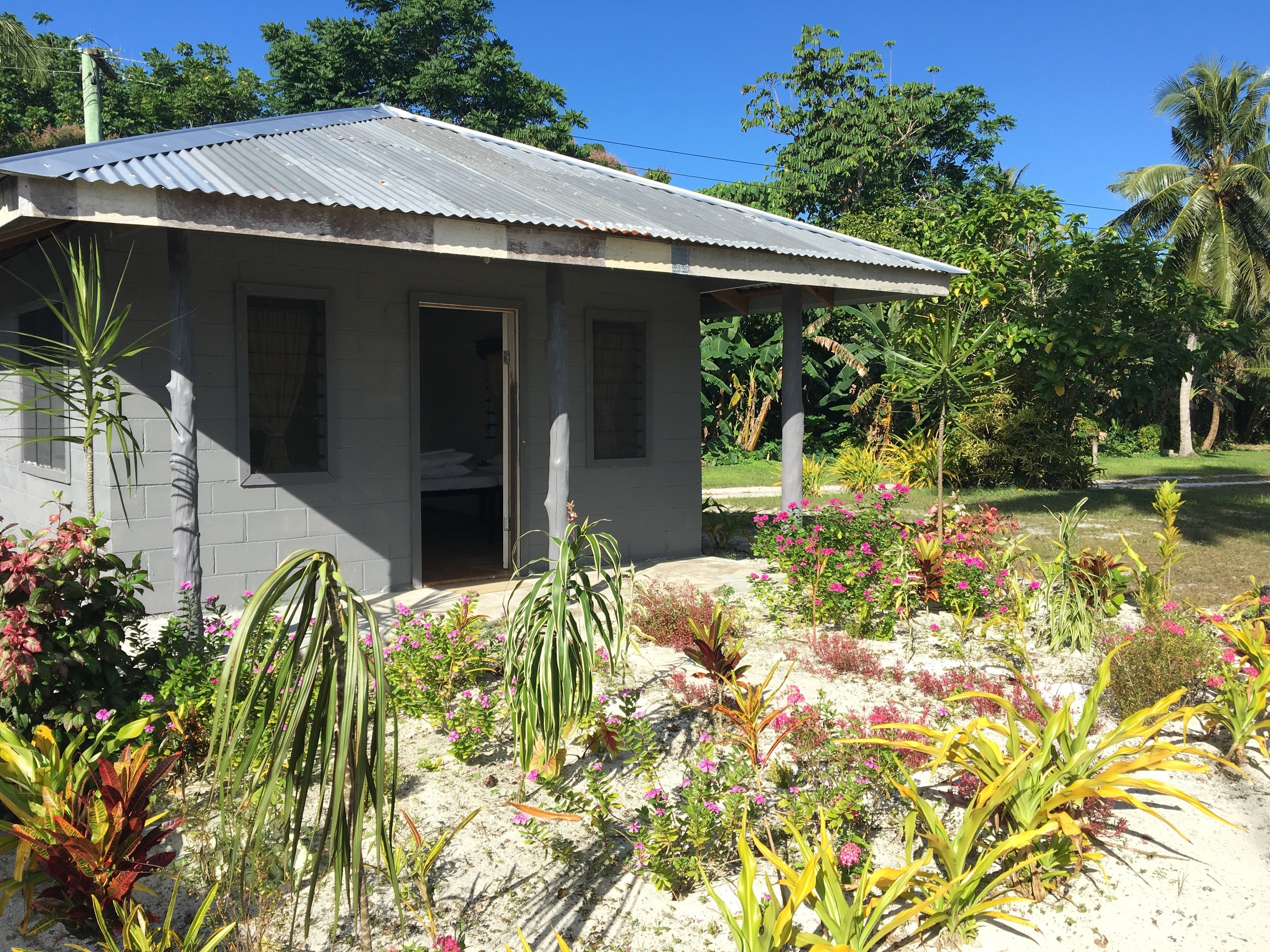 basic bungalow, 1 bedroom, shared bathroom, oceanfront | 1 bedroom, iron/ironing board, bed sheets