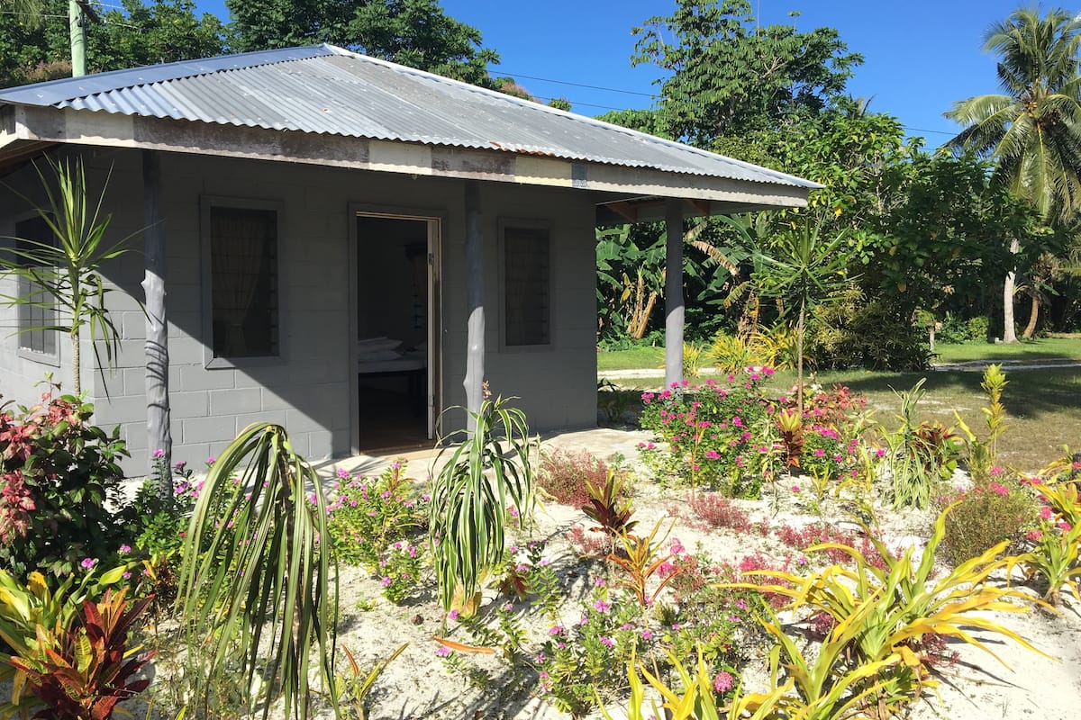 basic bungalow, 1 bedroom, shared bathroom, oceanfront | 1 bedroom, iron/ironing board, bed sheets