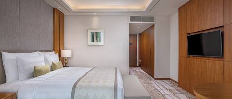 Premium bedding, down comforters, minibar, in-room safe