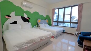 A hotel room with two beds, a large window with curtains, and a blue chair. - Have FUN villa (Hengchun)