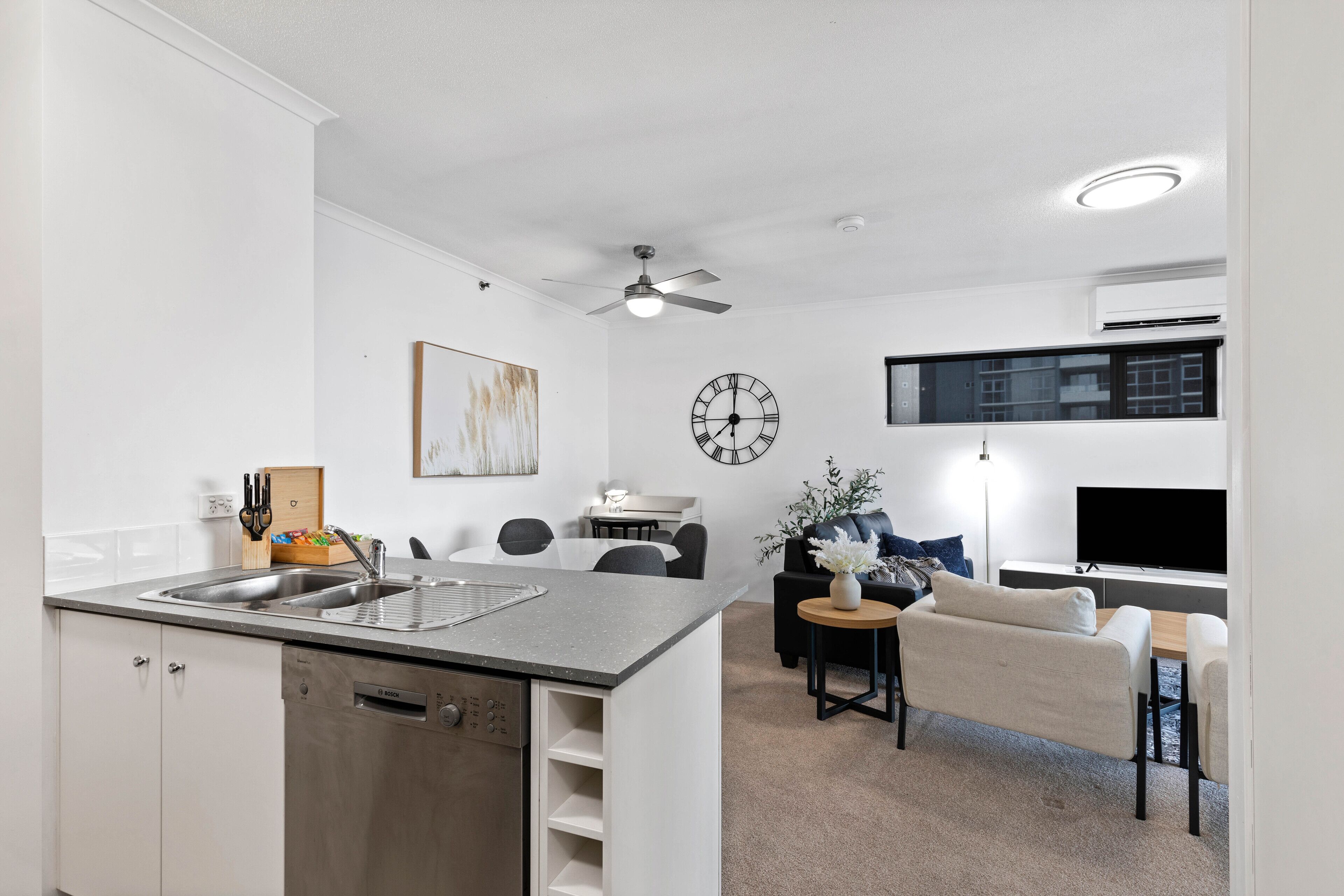 Executive Apartment, 1 Bedroom | Living area | 55-inch flat-screen TV with digital channels, TV, DVD player