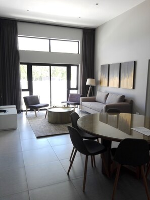 Apartment, 3 Bedrooms | Living area | 32-inch flat-screen TV with satellite channels, TV, Netflix - Mint Hotel Sandhurst (Sandton)