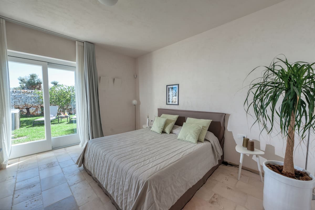 Junior Suite, Patio, Poolside | 1 bedroom, premium bedding, minibar, in-room safe