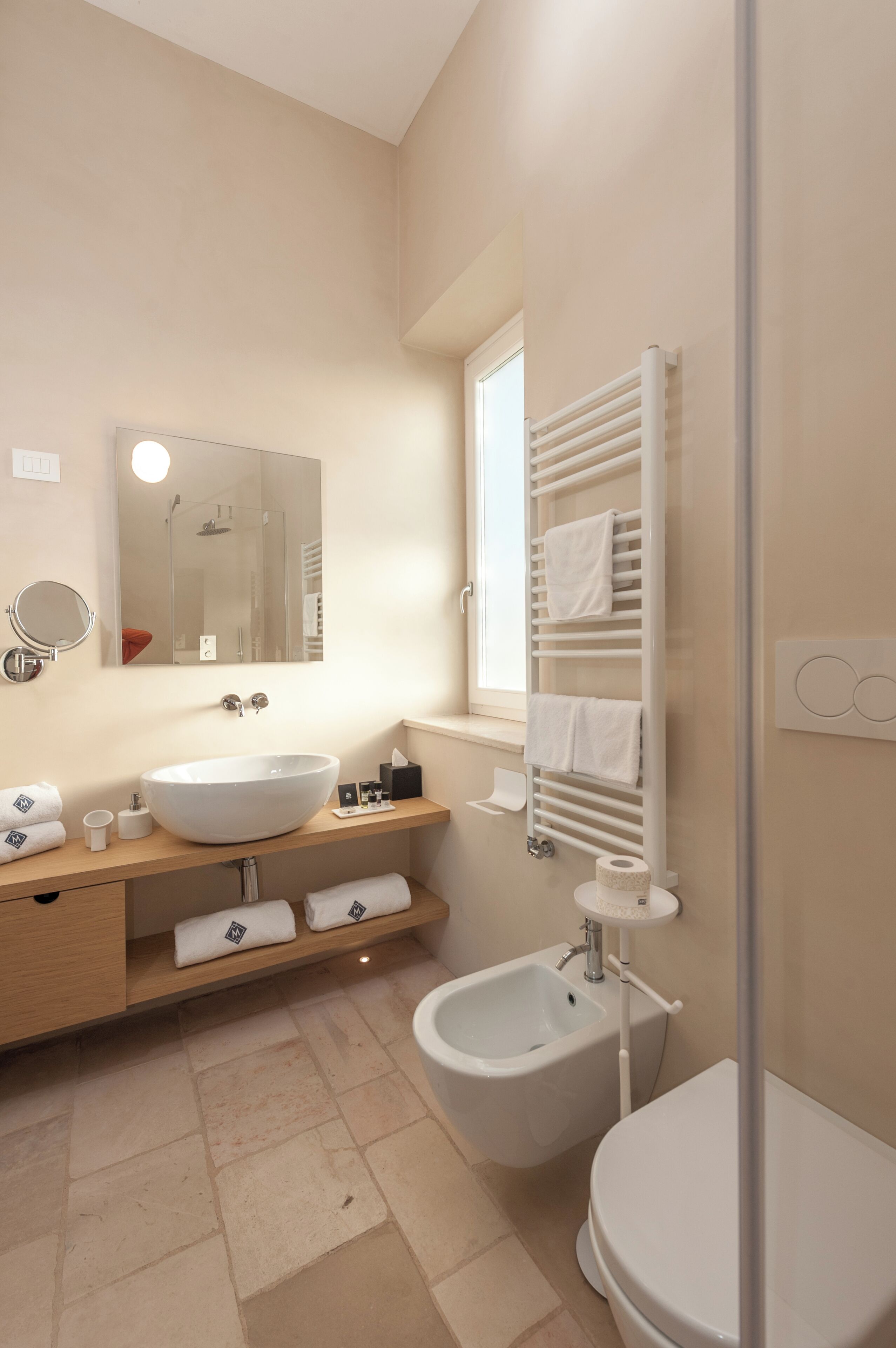 deluxe room, patio, garden area | bathroom | free toiletries, hair dryer, slippers, towels