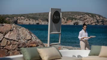 Breakfast, lunch, dinner served; Mediterranean cuisine, beach views
