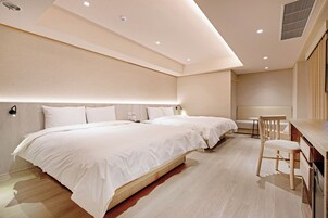 Premium bedding, down duvets, desk, free WiFi