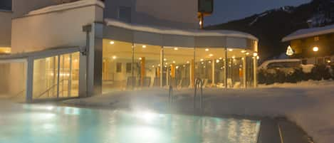 Indoor pool, outdoor pool, pool umbrellas, pool loungers