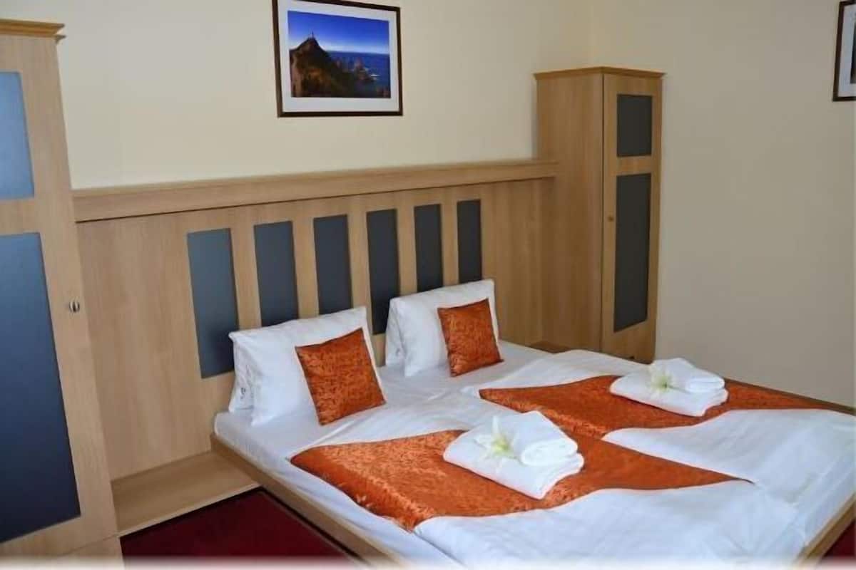 Standard Apartment (4 Adults) | Desk, iron/ironing board (on request), free cots/infant beds, free WiFi