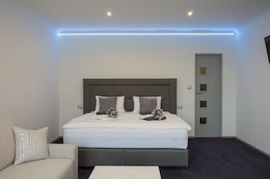 Deluxe Studio, Kitchenette (A - with Terrace) | Desk, soundproofing, iron/ironing board, free cribs/infant beds - Villa Kiwi (Mikulov)