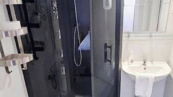 Standard Double Room (shower) | Bathroom | Shower, free toiletries, hair dryer, towels