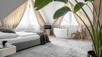 Deluxe-studiosviitti, 1 makuuhuone, kylpyamme | Yksilöllisesti sisustettu, yksilöllisesti kalustettu, äänieristys