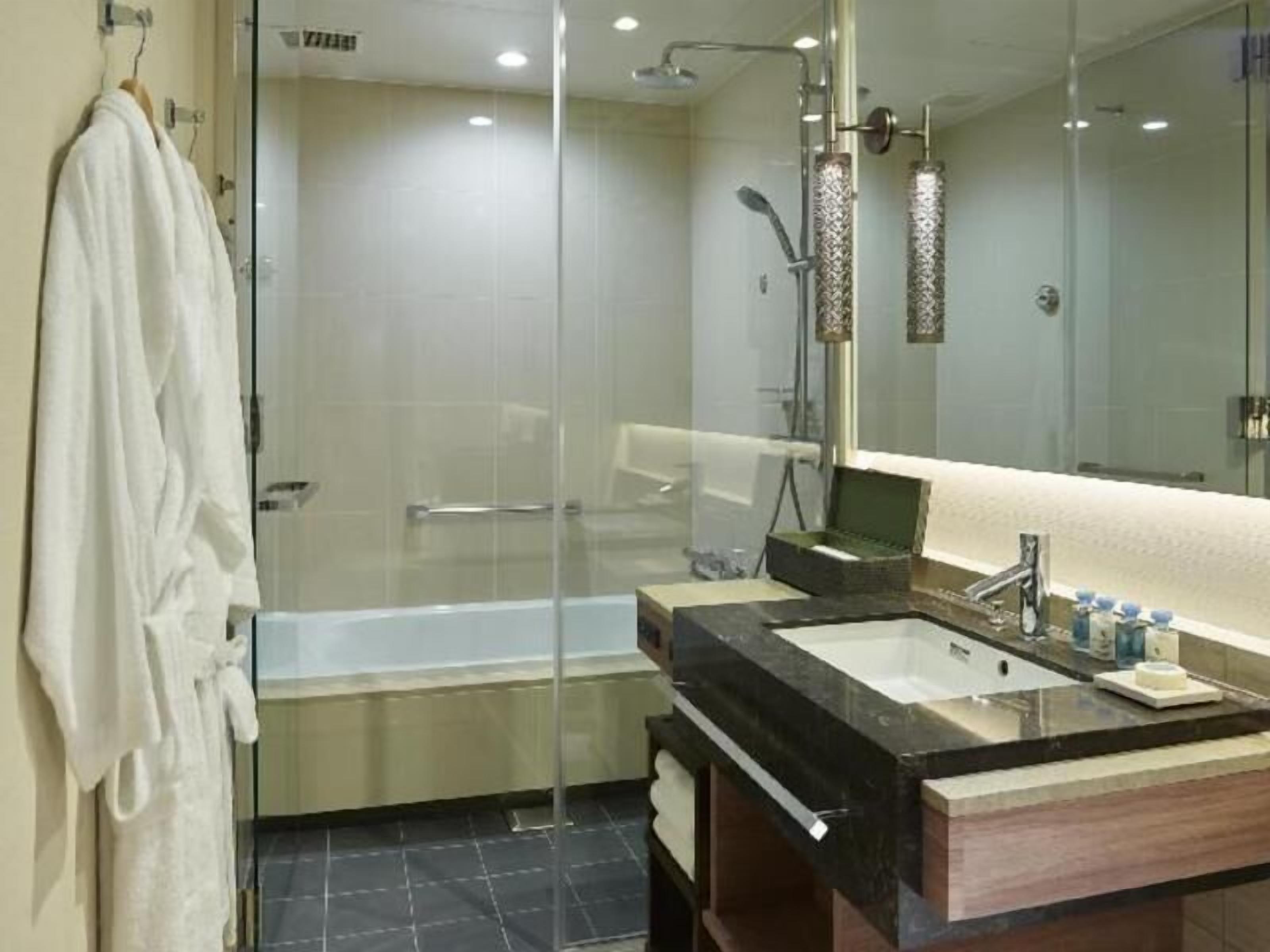 Bathroom | Separate tub and shower, free toiletries, hair dryer, bathrobes