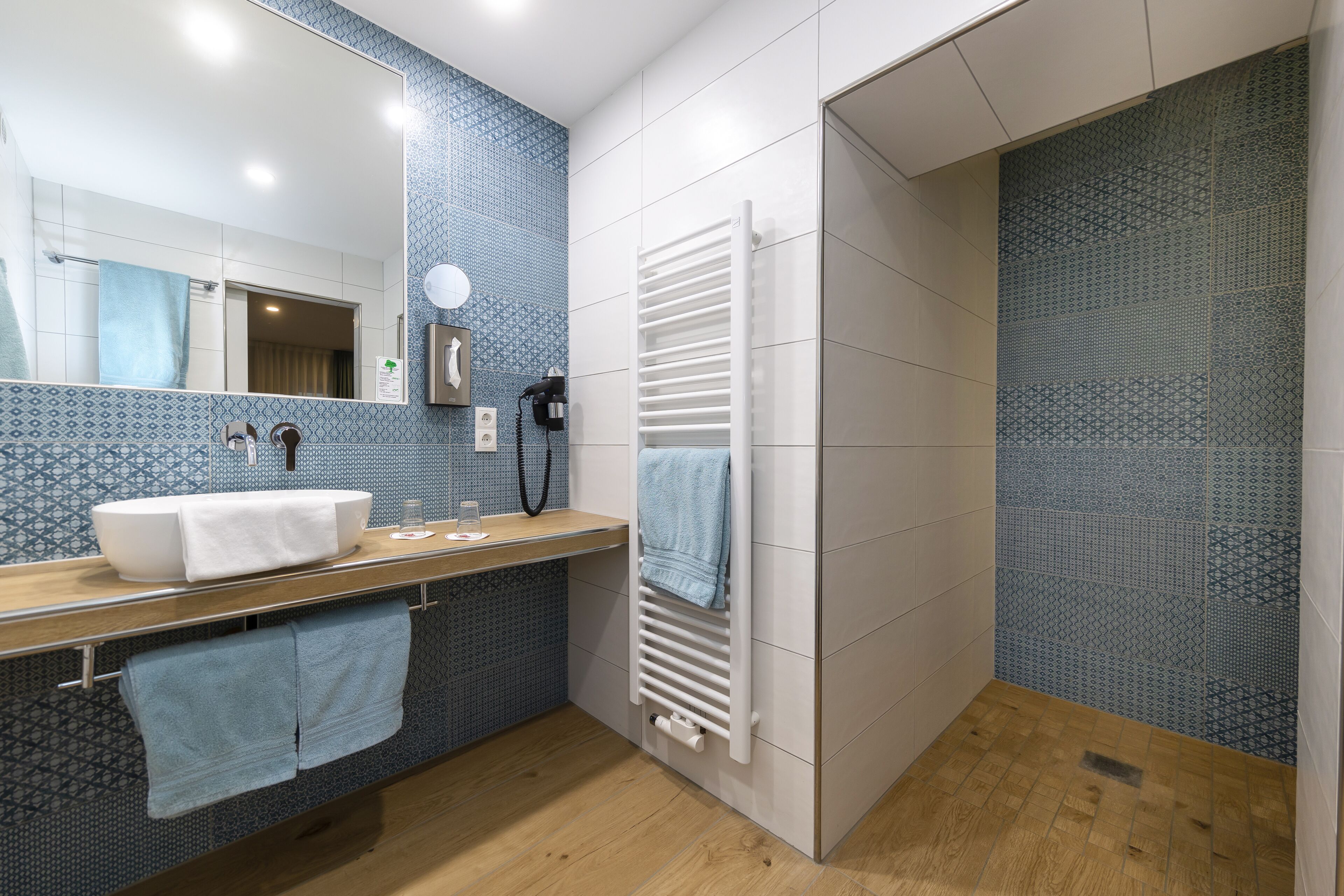 comfort double room (main building) | bathroom | shower, rainfall showerhead, free toiletries, hair dryer