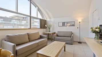 Superior Suite, 1 Bedroom | Living area | Flat-screen TV