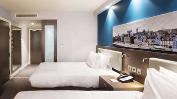 Twin Room, Non Smoking | In-room safe, desk, iron/ironing board, cribs/infant beds