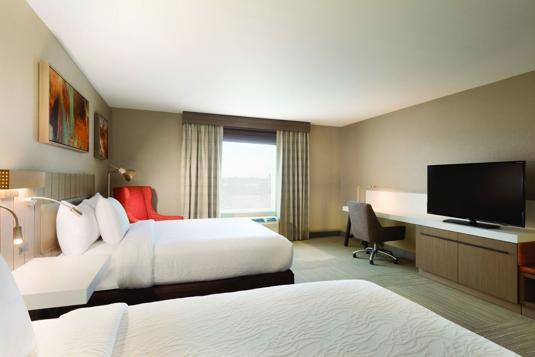 Premium bedding, desk, laptop workspace, iron/ironing board