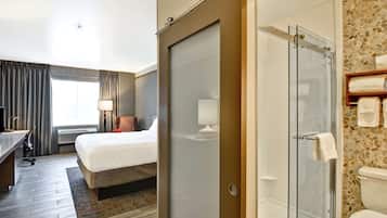 Premium bedding, desk, laptop workspace, iron/ironing board