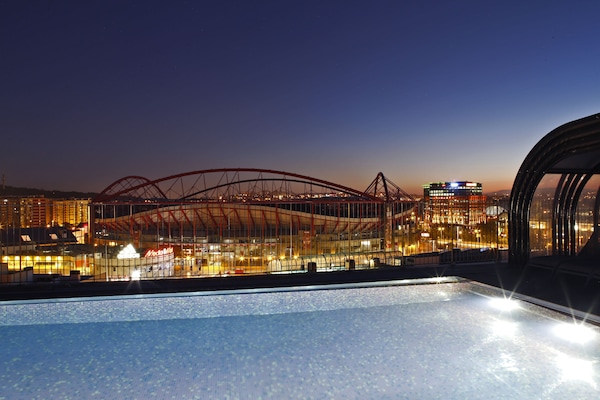 Seasonal outdoor pool, pool loungers