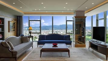 1 habitación, cubrecamas, minibar y caja de seguridad en la habitación