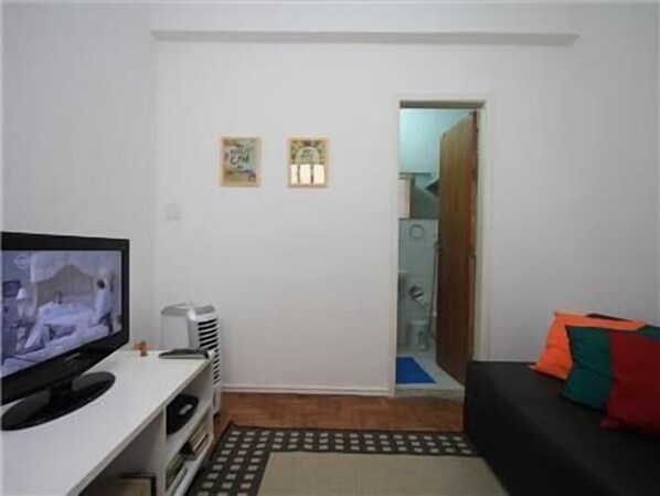 Apartamento standard, 1 quarto | Área de estar