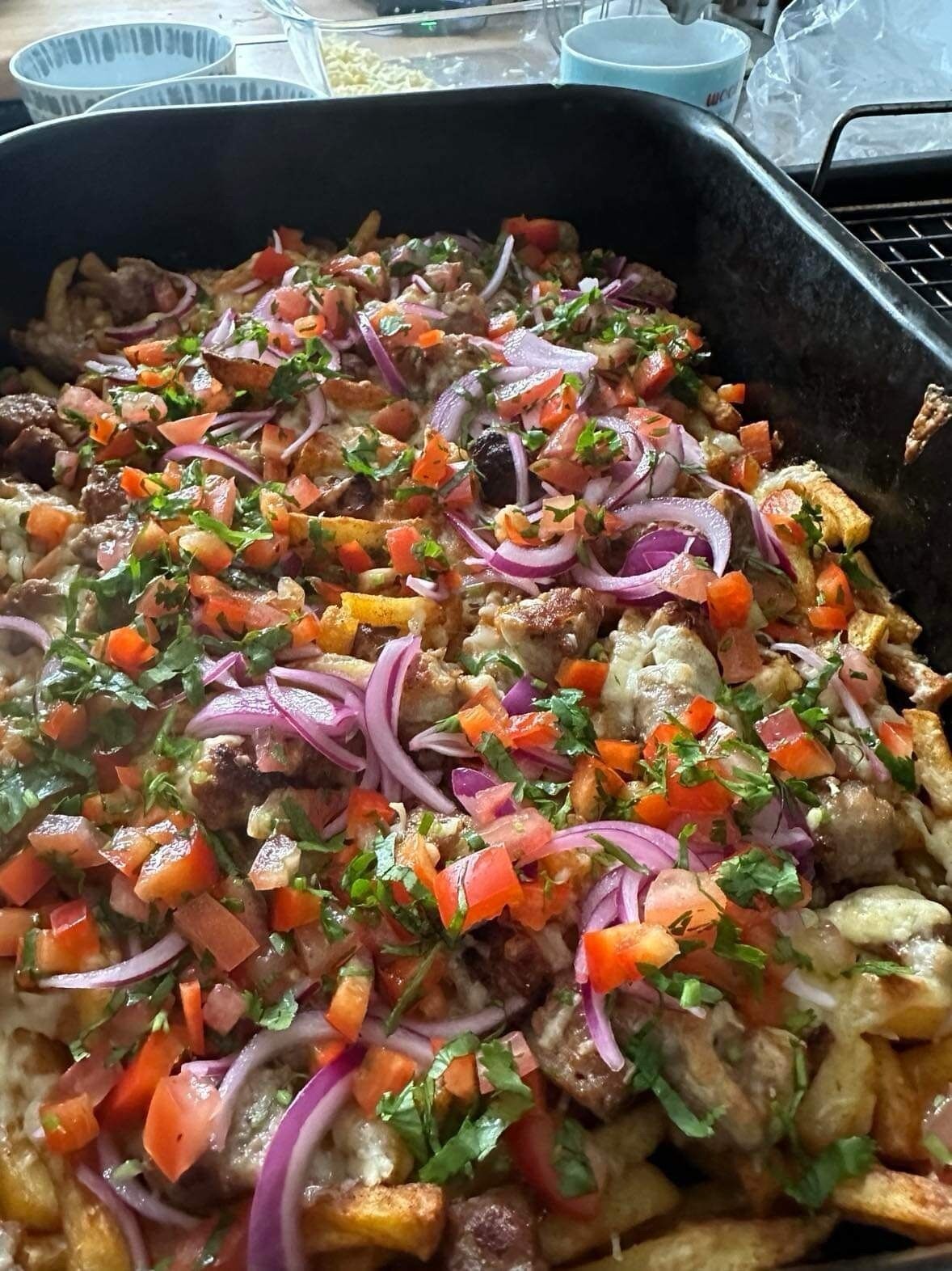 A tray of food with various ingredients.